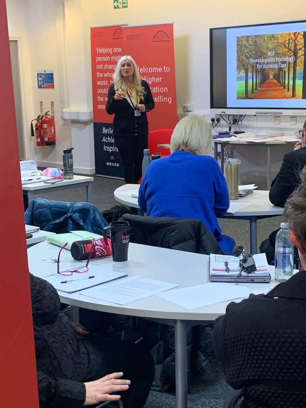 Helping with stage fright Sonya Hudson presenting to a group in a training room